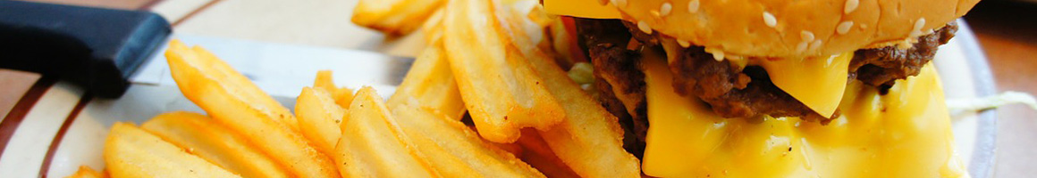 Eating Burger at Burger Love restaurant in Miami, FL.